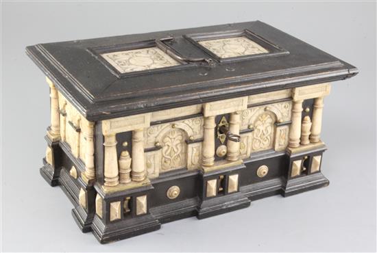 A 17th century Malines alabaster mounted ebonised casket, height 8.25in. with handle up 13.75in.